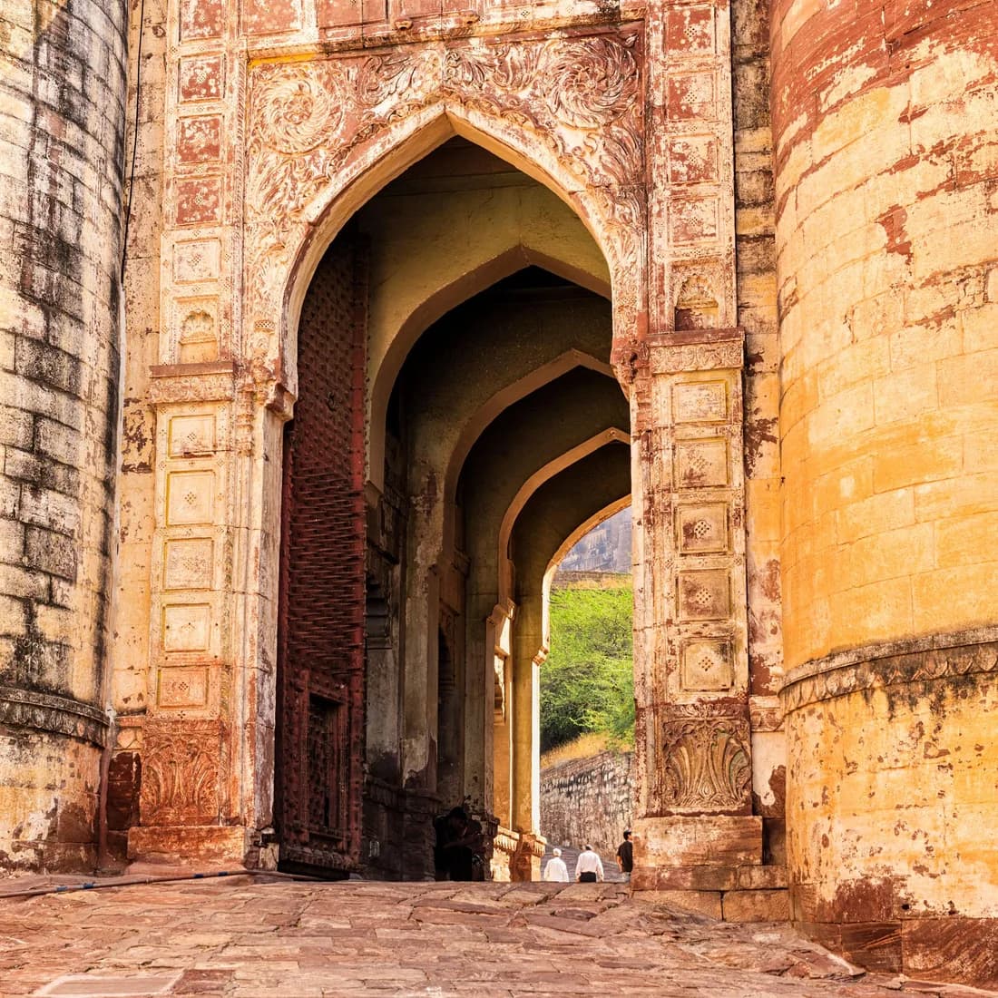Carved sandstone arches in Rajasthan, supplied brand reference photograph